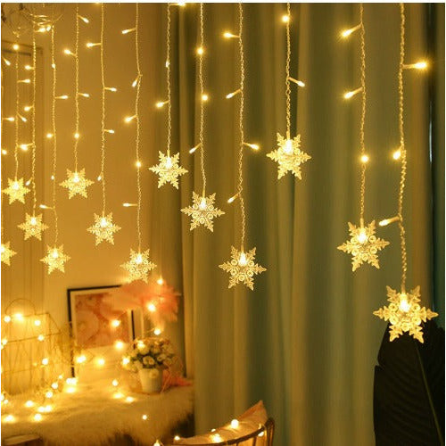 Snowflake Curtain Lights – hanging snowflake strands, warm white LED, plug-in