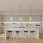 Alabaster Cylinder Pendant – natural stone, brass accents, hardwired