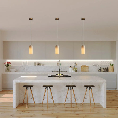 Alabaster Cylinder Pendant – natural stone, brass accents, hardwired