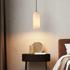 Alabaster Cylinder Pendant – natural stone, brass accents, hardwired