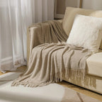 Knitted Throw – textured waffle knit, tasselled ends, lightweight