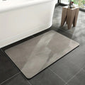 Stone Bath Mat – porous mineral surface, water-absorbent, non-slip