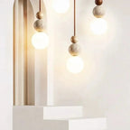 Travertine Pendant Light – stone and wood accent, minimalist matte finish