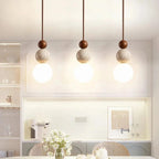 Travertine Pendant Light – stone and wood accent, minimalist matte finish